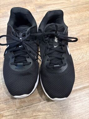 Nike Black Athletic Mesh Sneakers with White Swoosh